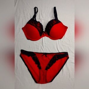 Jezebel bra and panty set. Red with black micro dots. 36D, medium panty.